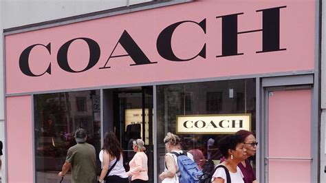 michael kors parent company|who is coach owned by.